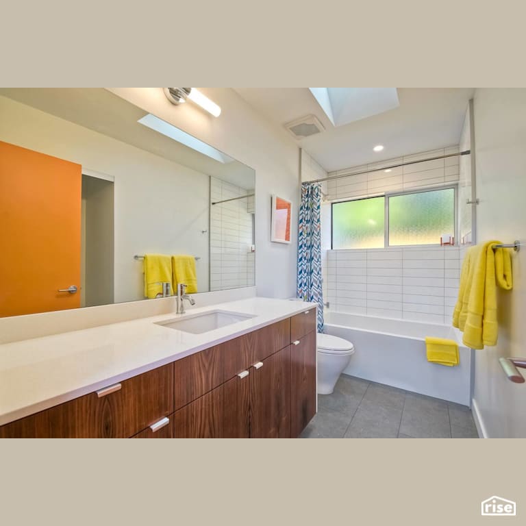 Bathroom with Low-Flow Bathroom Faucet by Alliance Green Builders