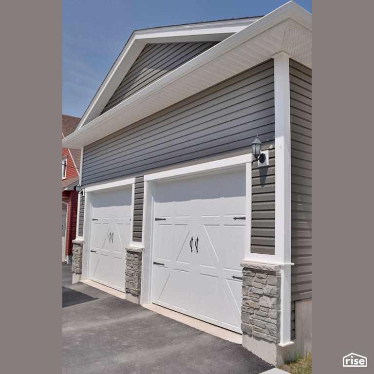 The Atlanta - Garage Door with Wall Mounted Outdoor Lighting by Justin Bowers Homes