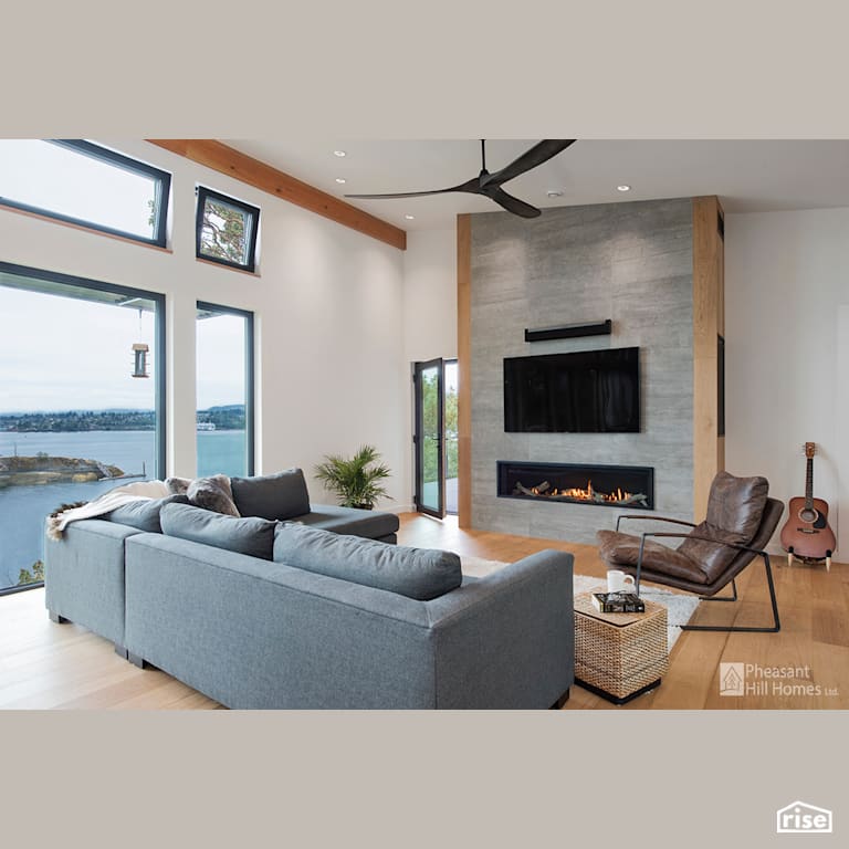 Living Room with Ceiling Light by Pheasant Hill Homes Ltd.