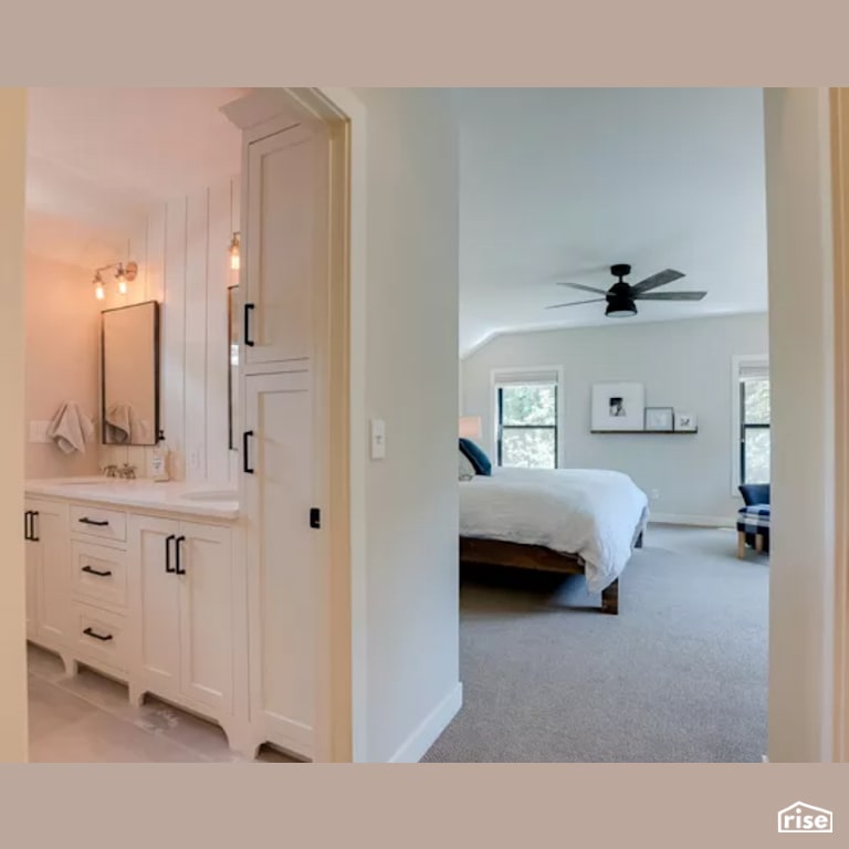 Master Bedroom with Wood Veneer Cabinet by Constructive Builders