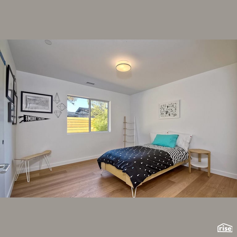 Bedroom with Ceiling Light by Alliance Green Builders
