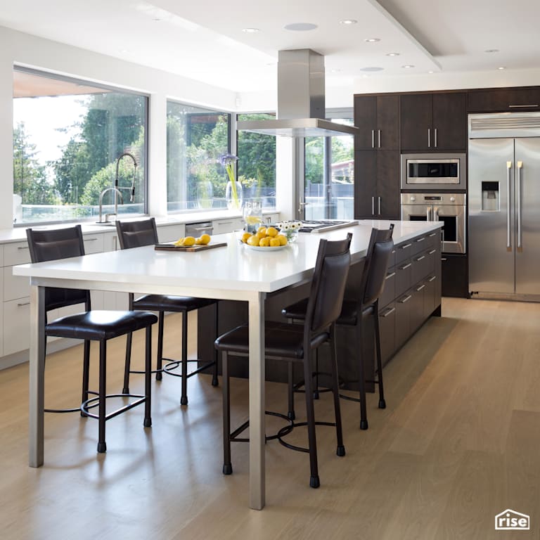 Kitchen with Triple Pane Window by Naikoon Contracting