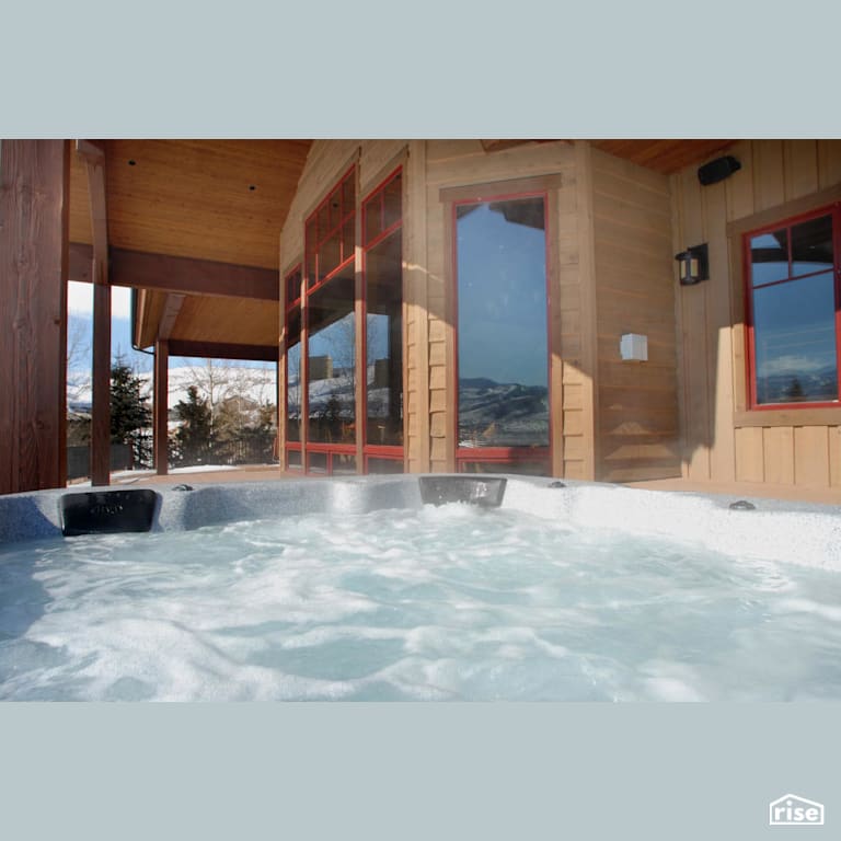 Deck with hot tub and mountain views with Full Foam Hot Tub by Alpen High Performance Products