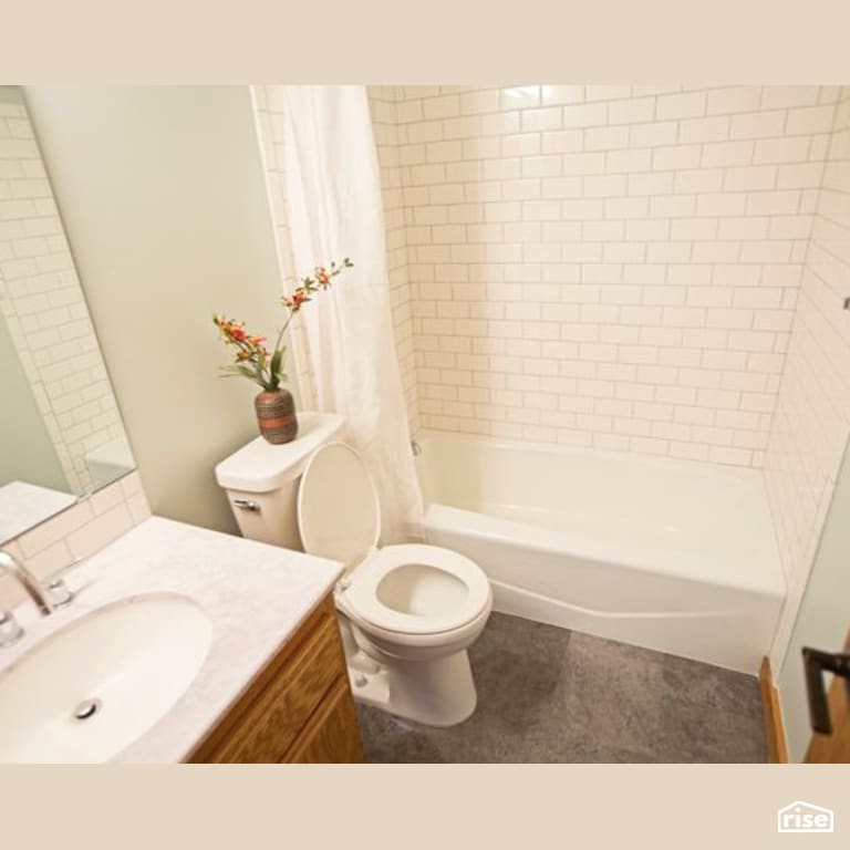 Bathroom with Dual Flush Toilet by Constructive Builders