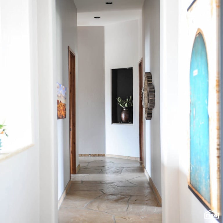 Hallway with Natural Stone Floors by PlaidFox