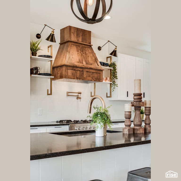 Feature wood range wood with wood candlesticks with Low-Flow Kitchen Faucet by Revolve Design Build