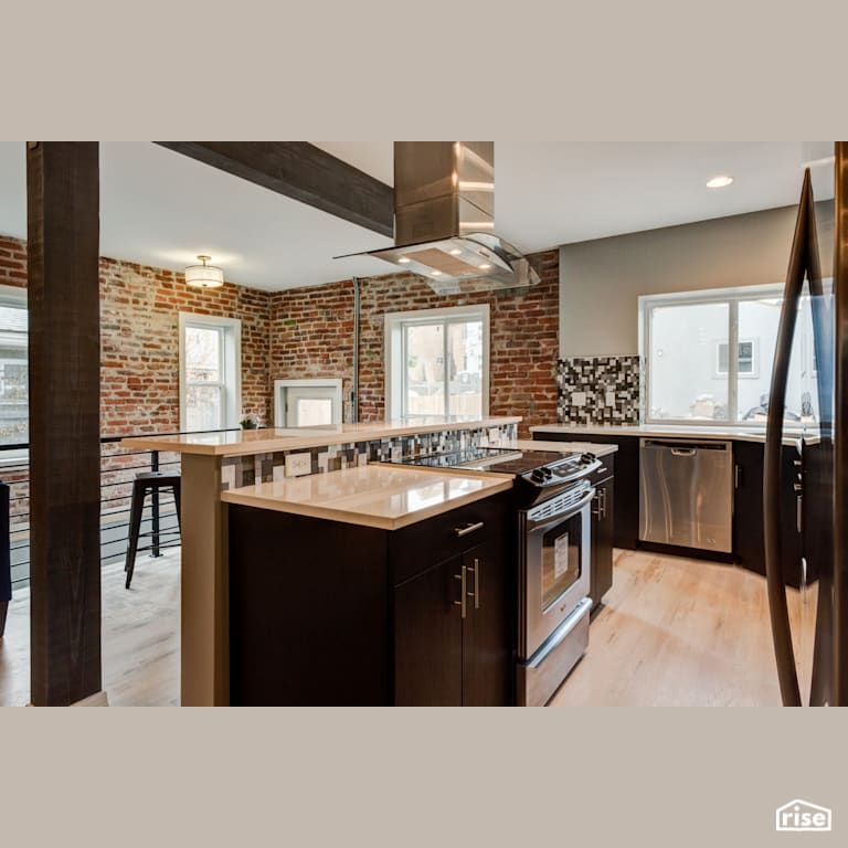 Open concept kitchen with exposed brick with Integrated LED by Alpen High Performance Products