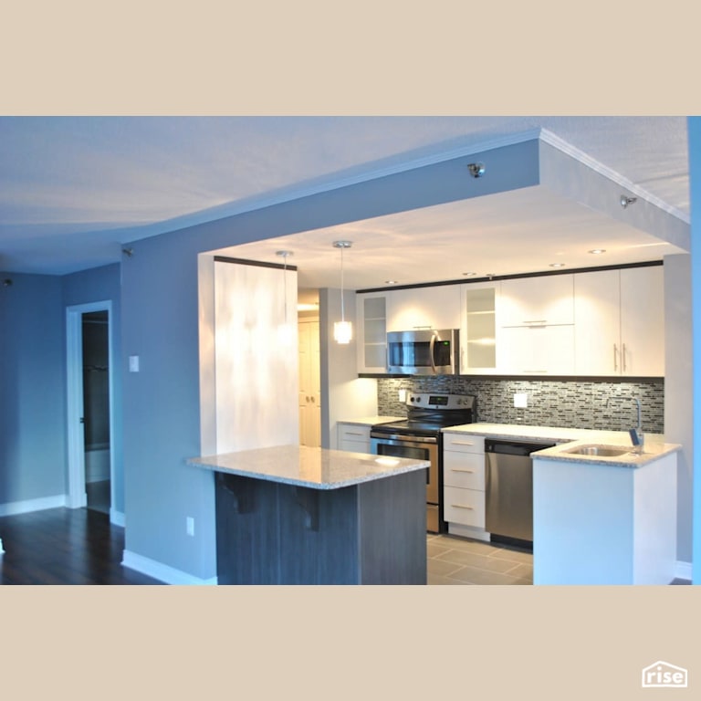 General Contracting Reno with Wood Veneer Cabinet by Amazing Space Interiors