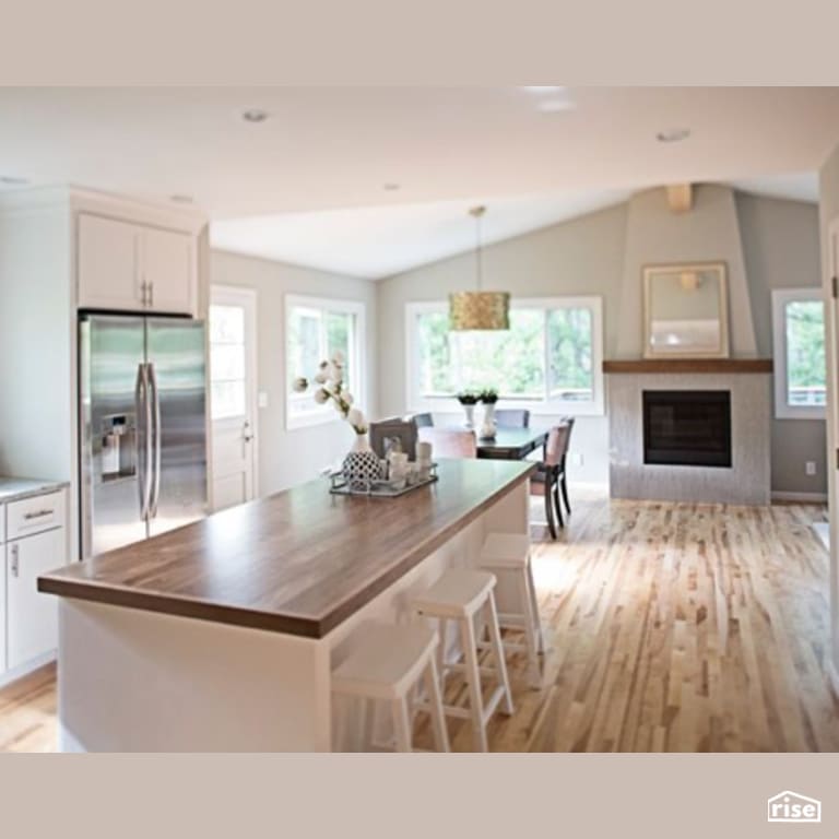 Kitchen with Gas Fireplace by Constructive Builders