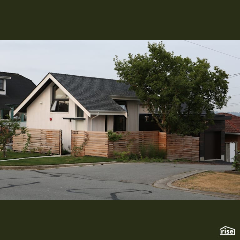 E7th Exterior Street view with Asphalt Shingles by Lanefab Design/Build