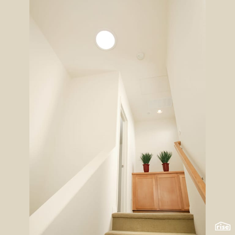 Skylight Installed for Beige Staircase with Tubular Skylight by Solatube International, Inc.