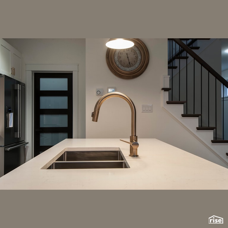 The Fleetview - Kitchen with Low-Flow Kitchen Faucet by Bowers Construction