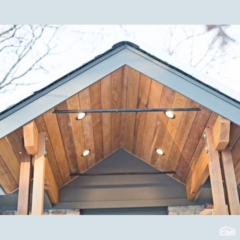 Exterior Entryway with Shiplap Wood Siding by Constructive Builders