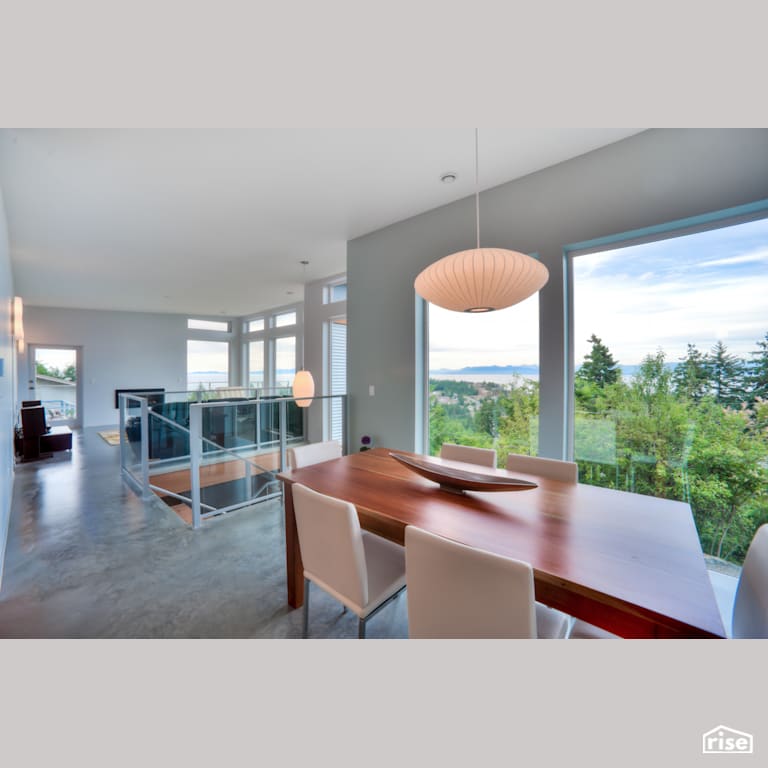 Hillside House - West Coast Modern Build - Dining Room with LED Lighting by Pheasant Hill Homes Ltd.