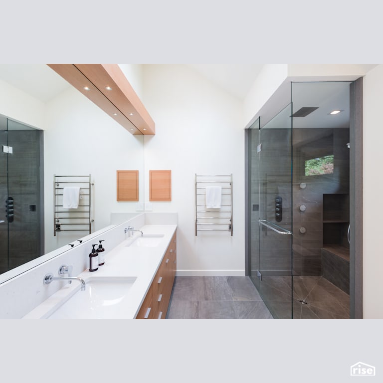 Bright Bathroom with Stone Countertop by Synthesis Design