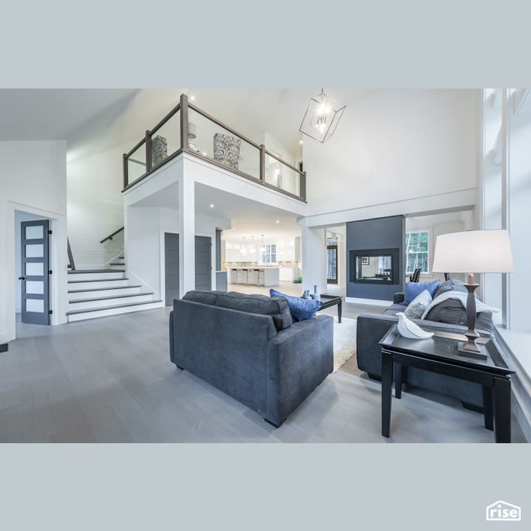 House in The Woods - Living Room with Gas Fireplace by Homes by Highgate