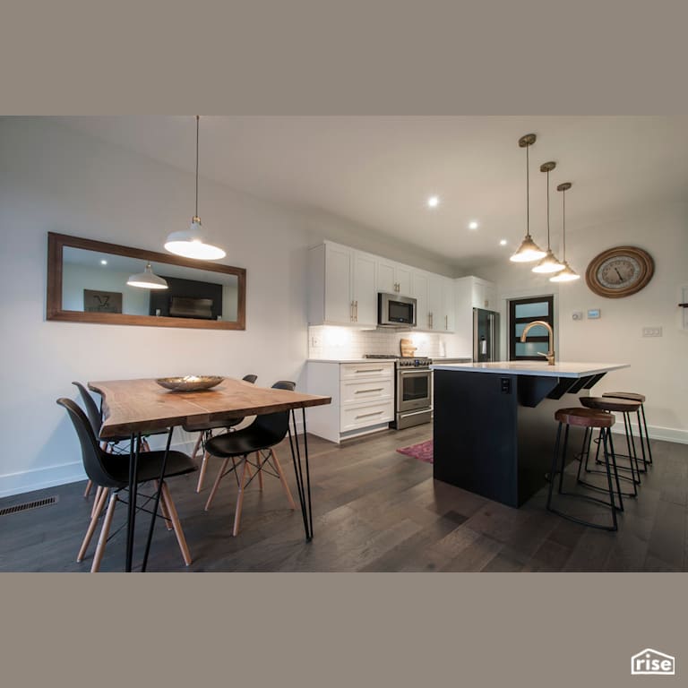 The Fleetview - Kitchen and Dining Room with Gas Range by Bowers Construction