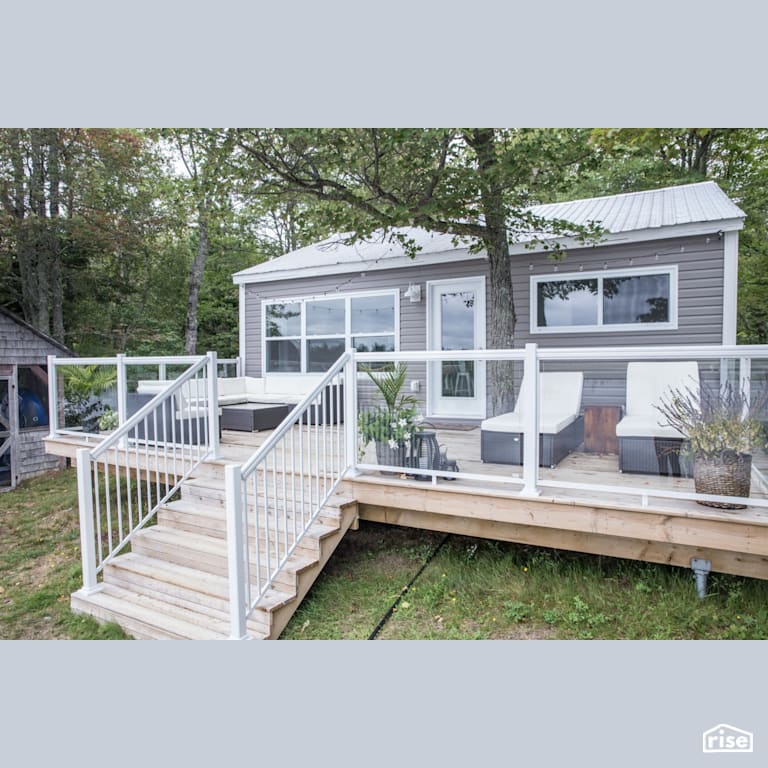 Cottage Deck with Wall Mounted Outdoor Lighting by Reimagine Designs