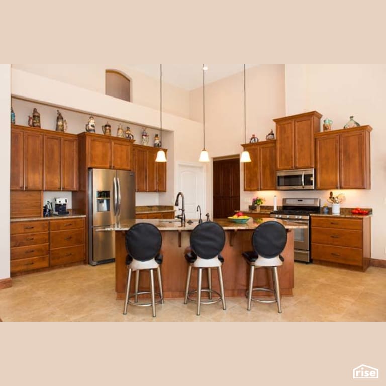 Kitchen with Gas Range by Winsome Construction