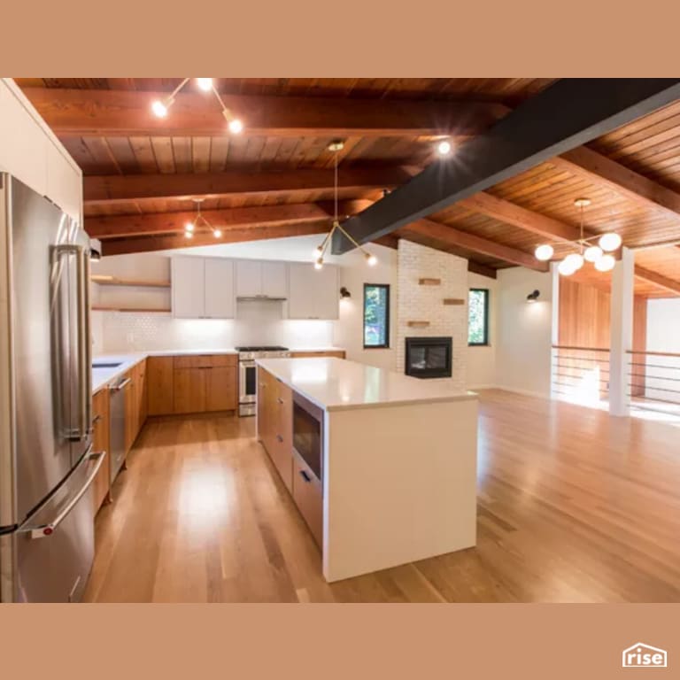 Kitchen with Gas Fireplace by Constructive Builders