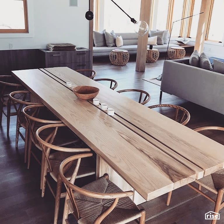 Open concept dining area with finished wood table with Interior Wood Finish by Vermont Natural Coatings
