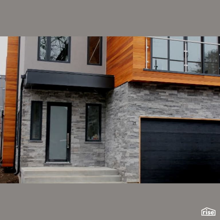 Stone entryway complimented by shiplap with Shiplap Wood Siding by Masonal Stone Inc