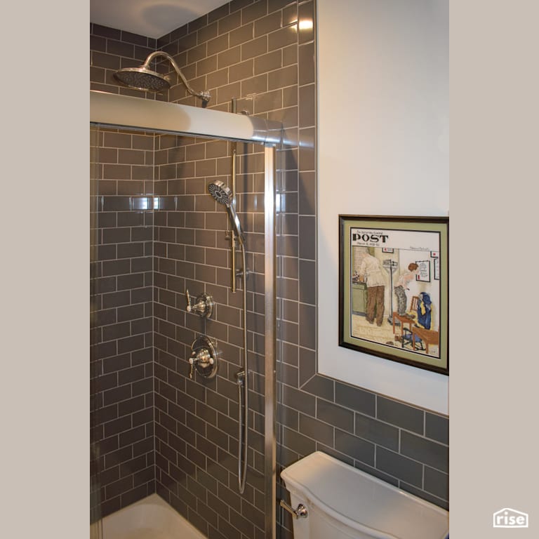 Bathroom with Low-Flow Showerhead by Ellenwood Homes