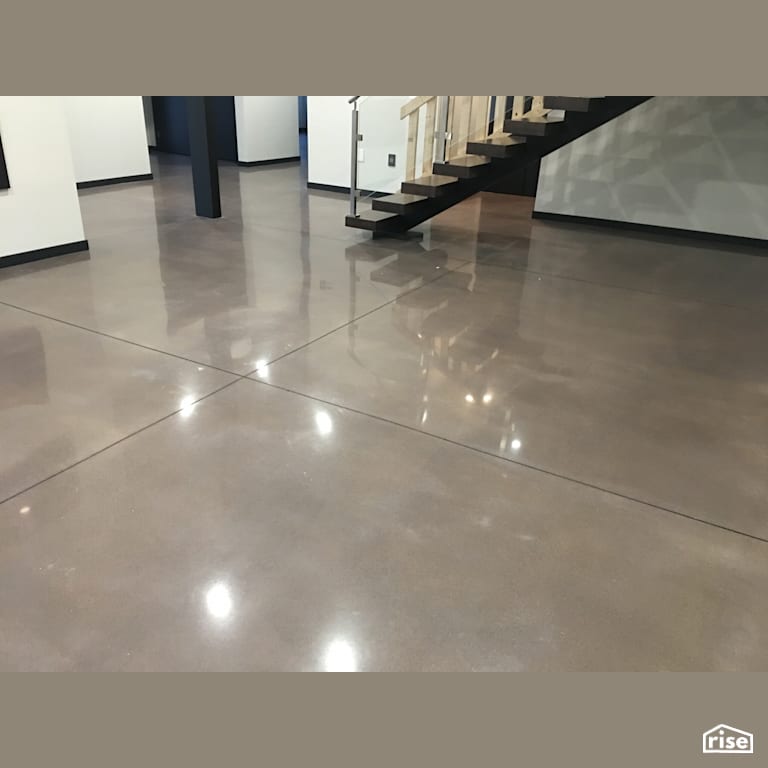 800 Grit cream polish with grey dye with Concrete Flooring by DeltaCrete