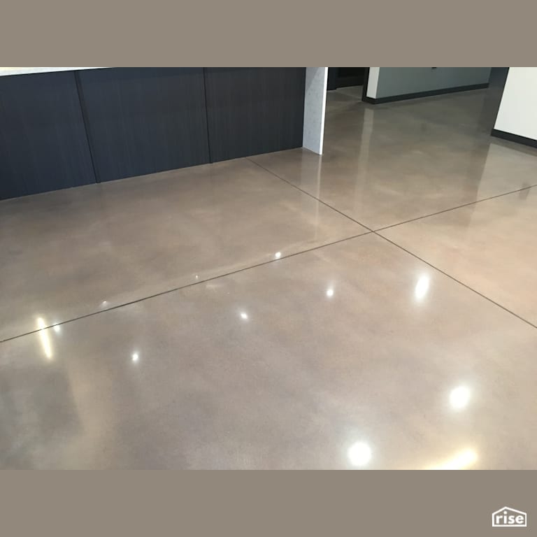 800 Grit cream polish with grey dye with Concrete Flooring by DeltaCrete