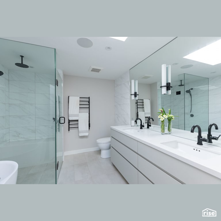 Bathroom in White with Low-Flow Showerhead by Synthesis Design