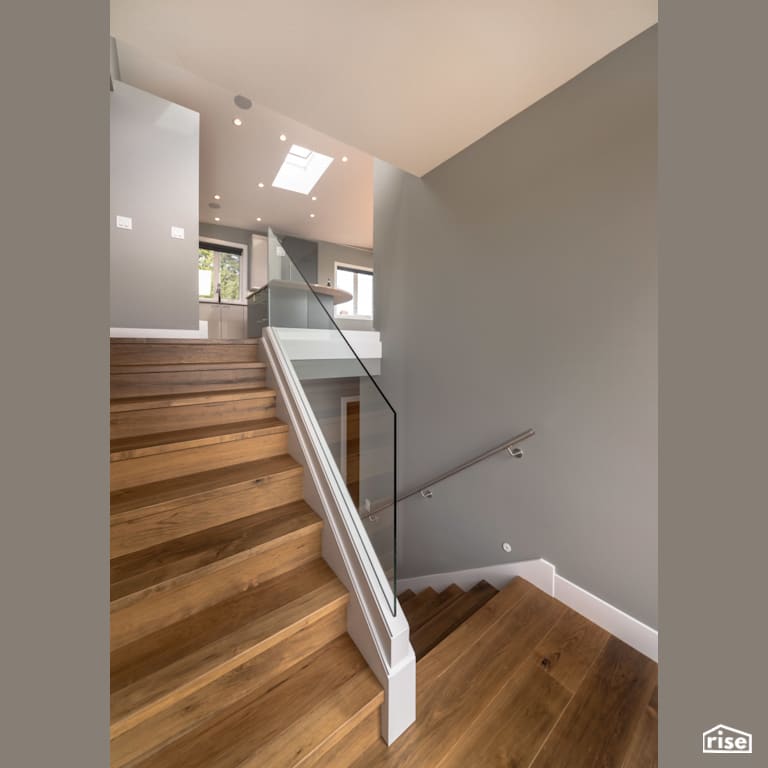 Staircase with Integrated LED by My House Design/Build Team Ltd.