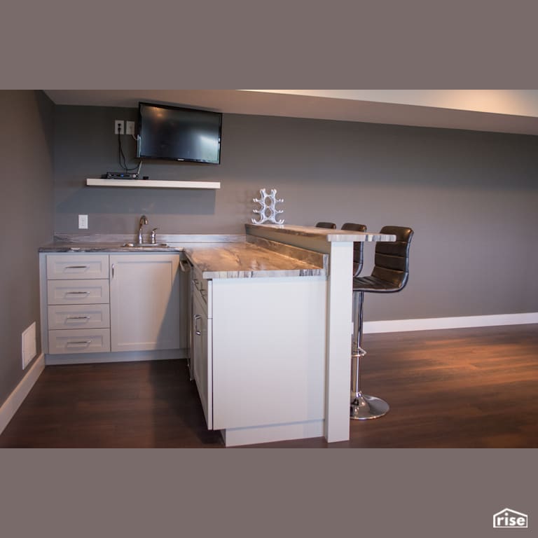 The Atlanta - Home Bar with Laminate Flooring by Justin Bowers Homes