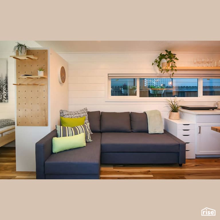 Container Home With Sectional Couch with Double Pane Window by Alternative Living Spaces