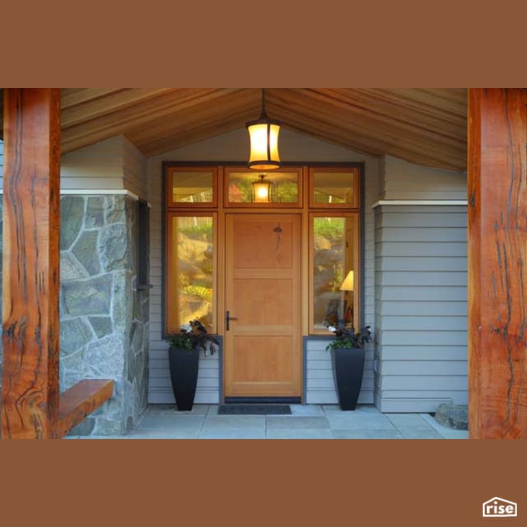 Front Entryway with Solid Wood Door by Winsome Construction