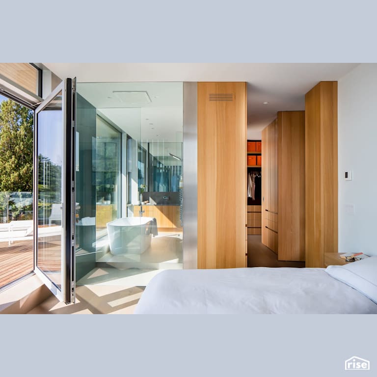 Master Bedroom with glass-walled ensuite with Tilt-and-Turn Patio Door by Naikoon Contracting