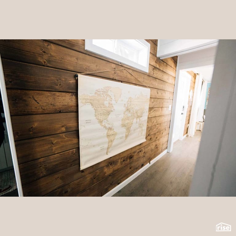 Container Home Wood Shiplap Feature Wall with Laminate Flooring by Alternative Living Spaces