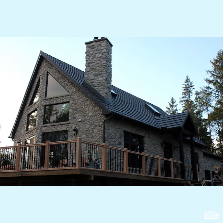 Stone cottage with Stone Siding by Masonal Stone Inc