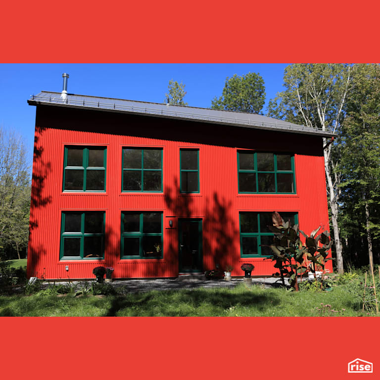 River Road Exterior Back with Aluminum Siding by The Conscious Builder