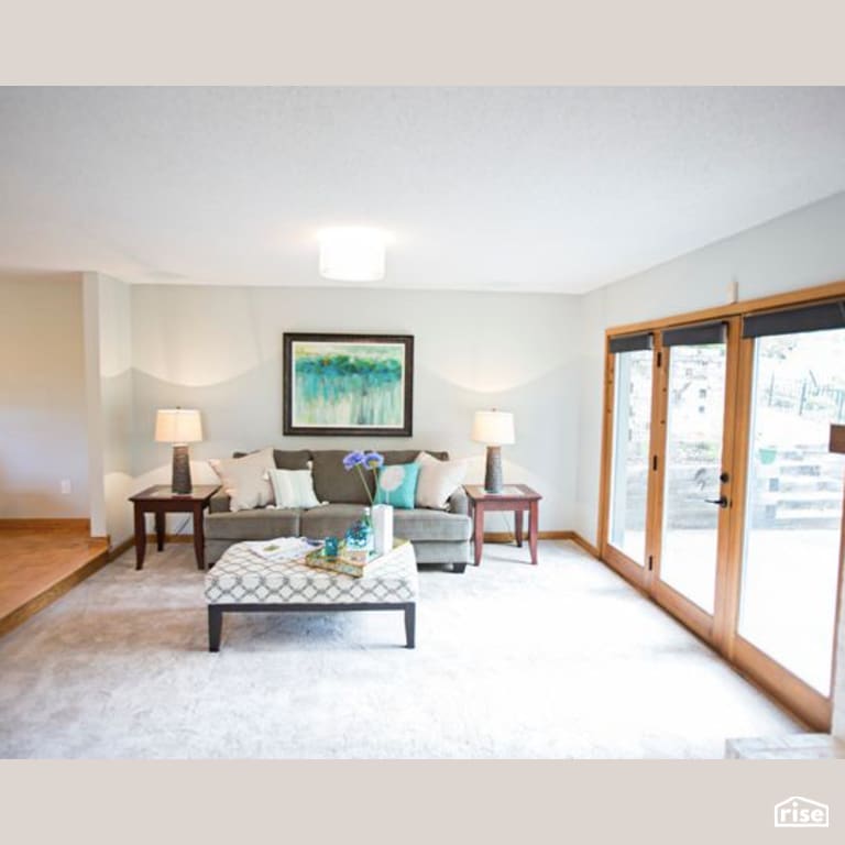 Living Room with Energy Star Exterior Door by Constructive Builders