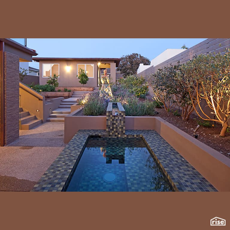 Back Exterior with Accent Outdoor Lighting by Alliance Green Builders