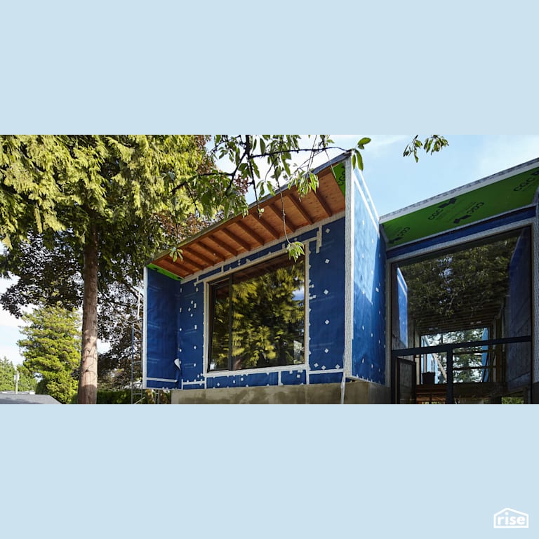 Vapor control layer on BC Passive House with Exterior Air Sealing Tape by SIGA North America