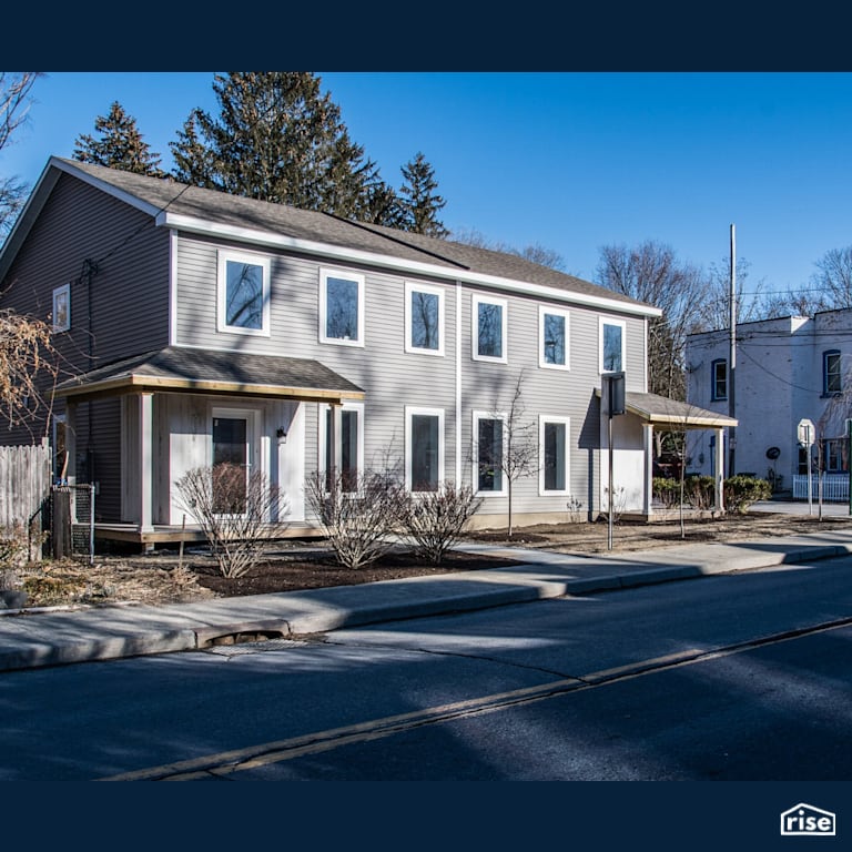 Passive House certified townhouse exterior with Passive House Door by Alpen High Performance Products