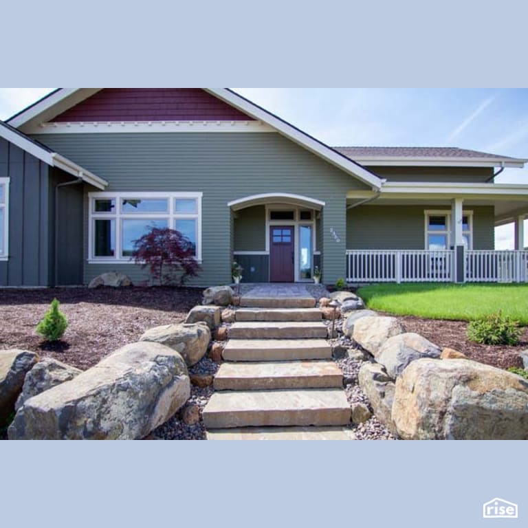 Home Exterior with Fixed Window by Winsome Construction
