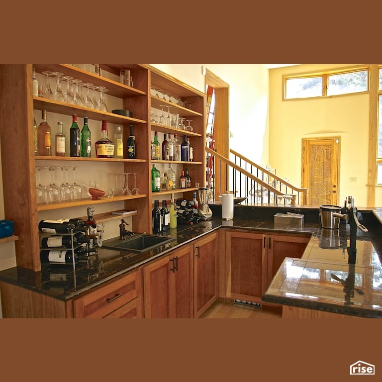 Home bar off entryway with Low-Flow Kitchen Faucet by Revolve Design Build