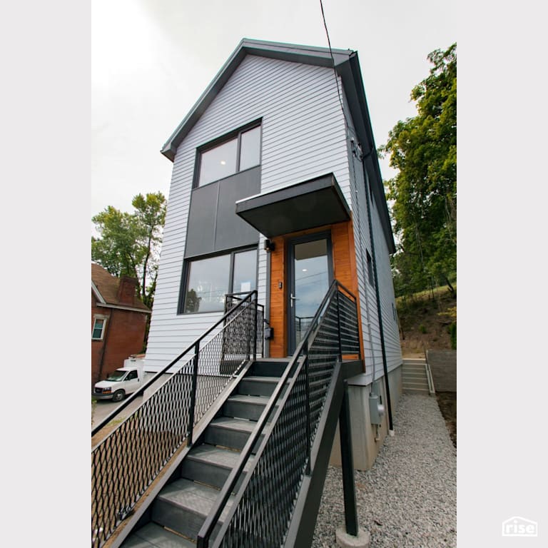 Black Street Development Entryway with Shiplap Wood Siding by Module