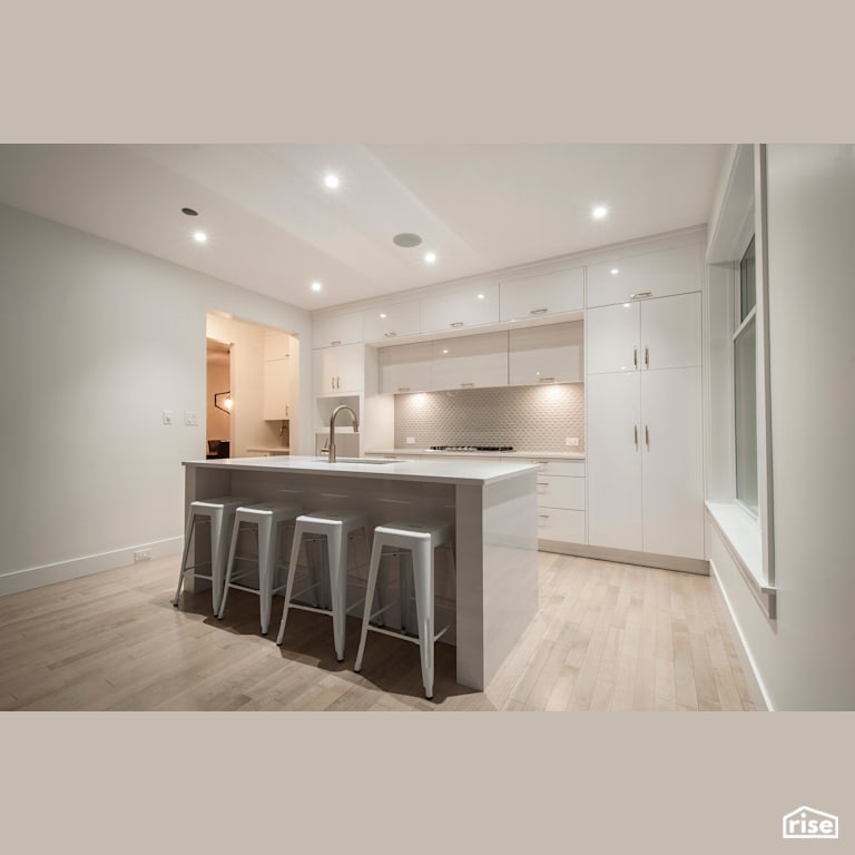 Modern Retreat - Kitchen with Gas Range by Homes by Highgate