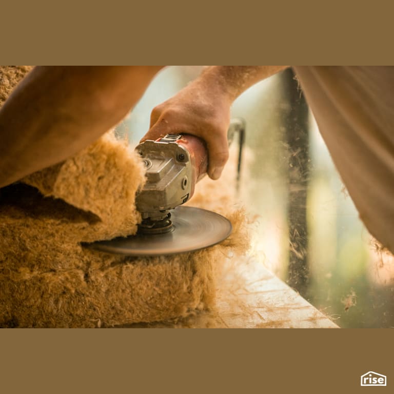 Cutting HempWool with a Metal Grinder with Hemp Batt Insulation by Hempitecture