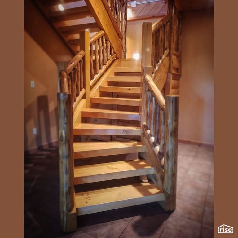Finished timber staircase leading downstairs with Interior Wood Finish by Vermont Natural Coatings