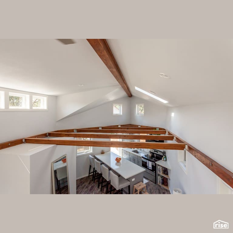 Triangle House with Ceiling Light by HARKA Architecture, LLC