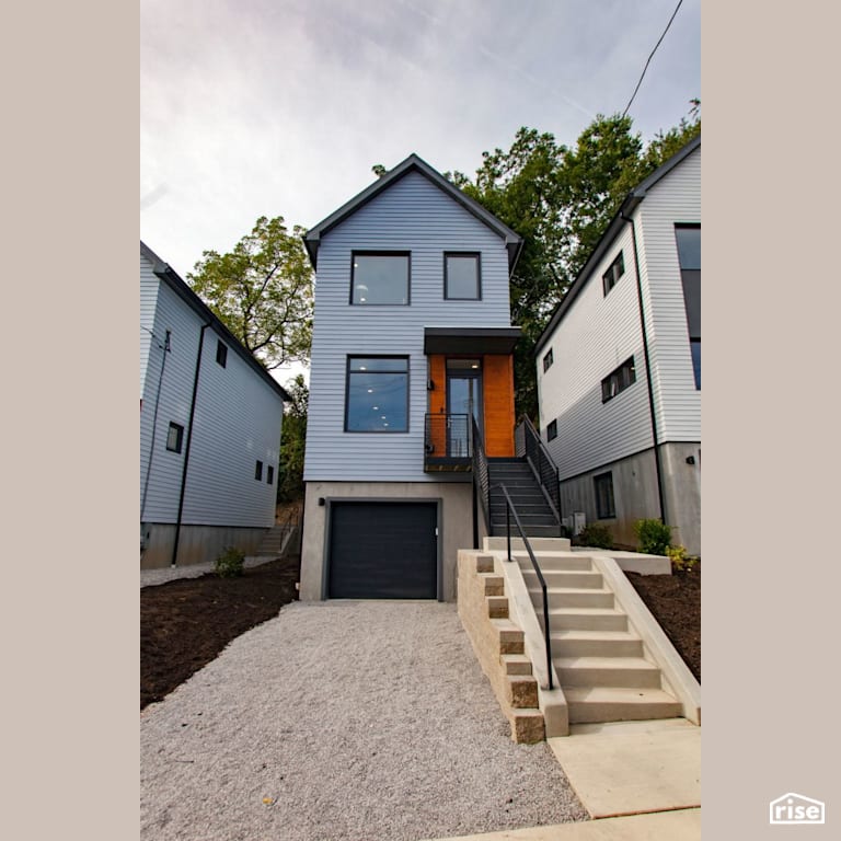 Black Street Development Exterior Center View with Accent Outdoor Lighting by Module